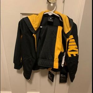 2T Nike track suit. New with tags. Black/yellow